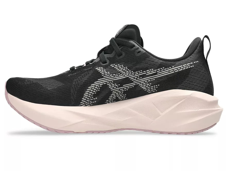 Women's Asics Novablast 5. Black upper. White midsole. Medial view.