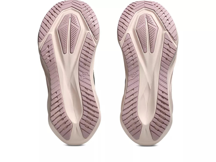 Women's Asics Novablast 5. Black upper. White midsole. Bottom view.