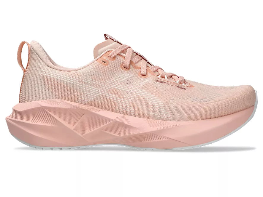 Women's Asics Novablast 5. Light Pink upper. Light Pink midsole. Lateral view.