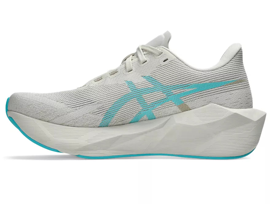 Women's Asics Novablast 6. Off White upper. Off White midsole. Medial view.