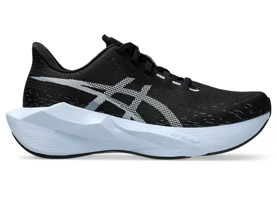 Women's Asics Novablast 6. Black upper. White midsole. Lateral view.