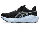 Women's Asics Novablast 6. Black upper. White midsole. Medial view.