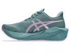 Women's Asics Novablast 6. Green upper. Green midsole. Medial view.