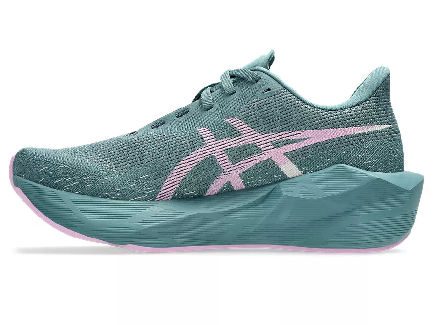 Women's Asics Novablast 6. Green upper. Green midsole. Medial view.