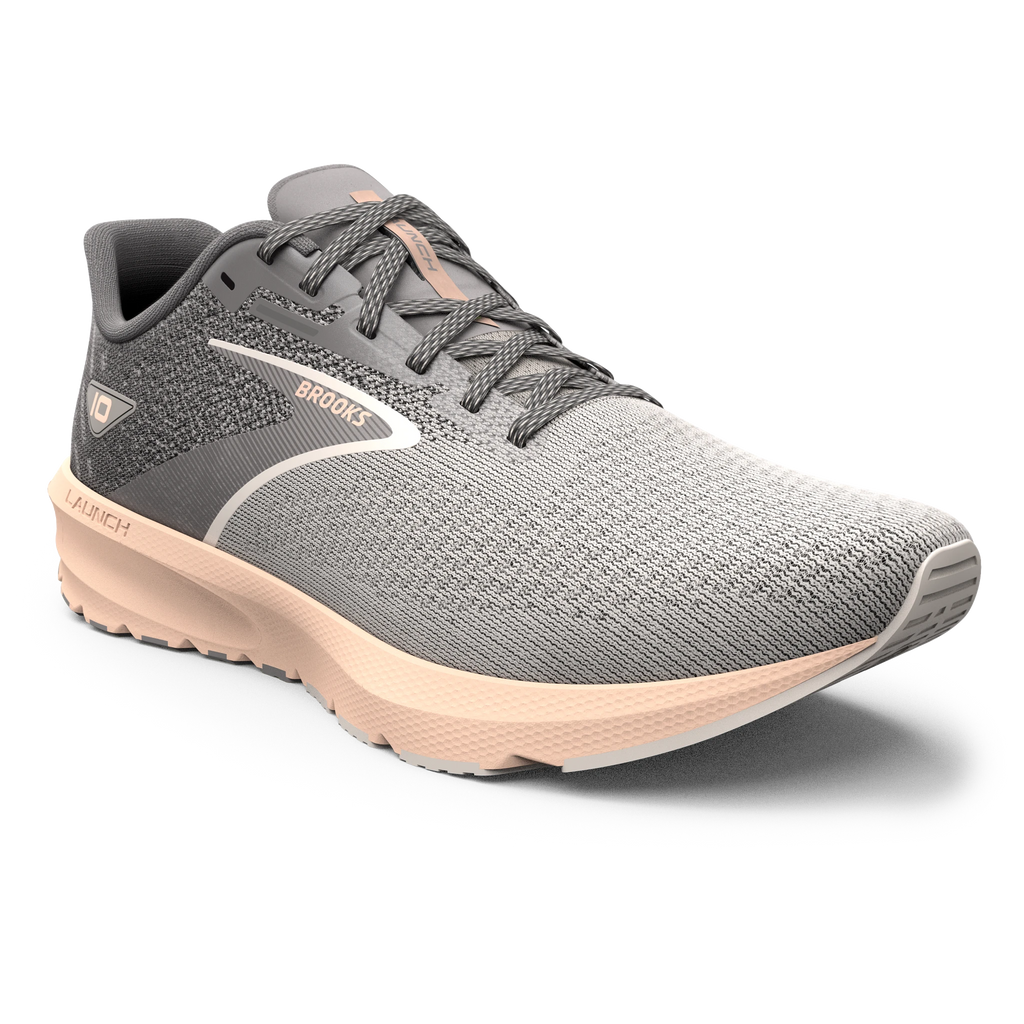 Women's Brooks Launch 10. Grey upper. Off pink midsole. Front/Lateral view.