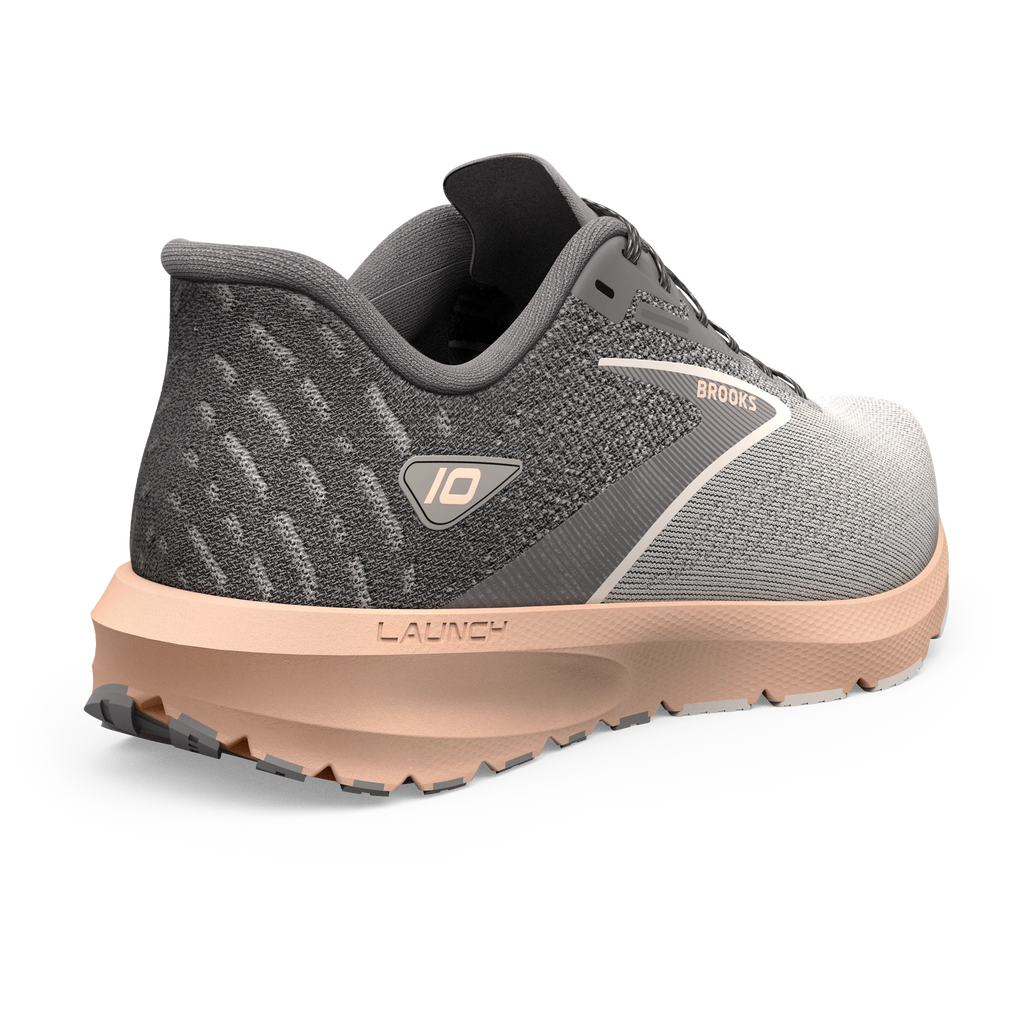 Women's Brooks Launch 10. Grey upper. Off Pink midsole. Rear/Lateral view.