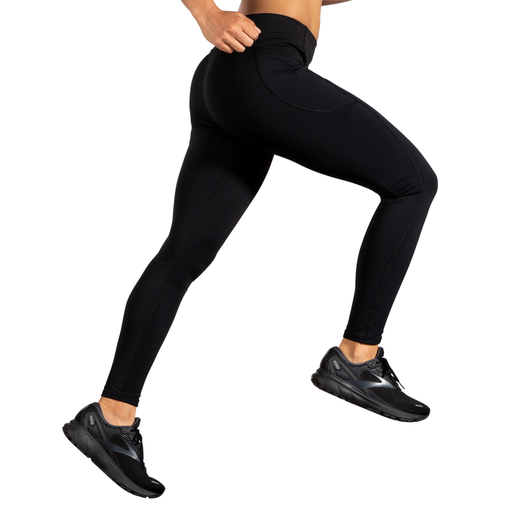 Women's Brooks Moment Tights. Black. Lateral view.