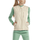 CEP Cold Weather Reversible Vest. Women's. Cream. Front view on model.