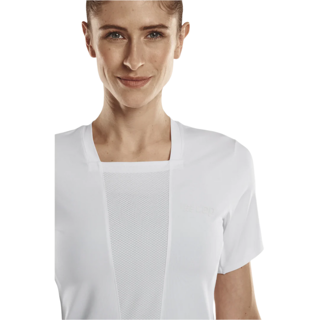 CEP Run Shirt 4.0 Short Sleeve Women's. White. Front view on model. 