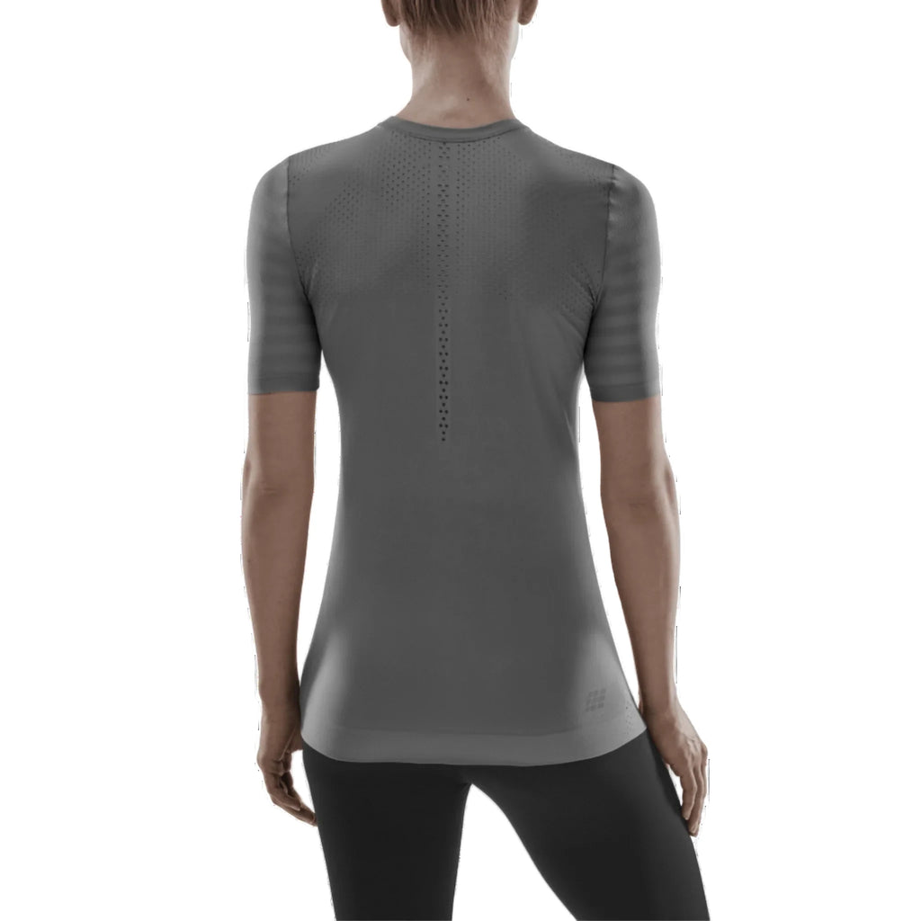 Women's CEP Ultralight Short Sleeve. Grey. Back view.