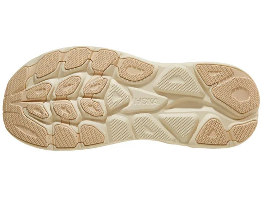 Women's Hoka Clifton 10. Vanilla upper. Vanilla midsole. Bottom view.