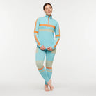 Women's Cotopaxi Debajo Seamless Baselayer Tights. Blue, tan, and orange pattern. Front view.