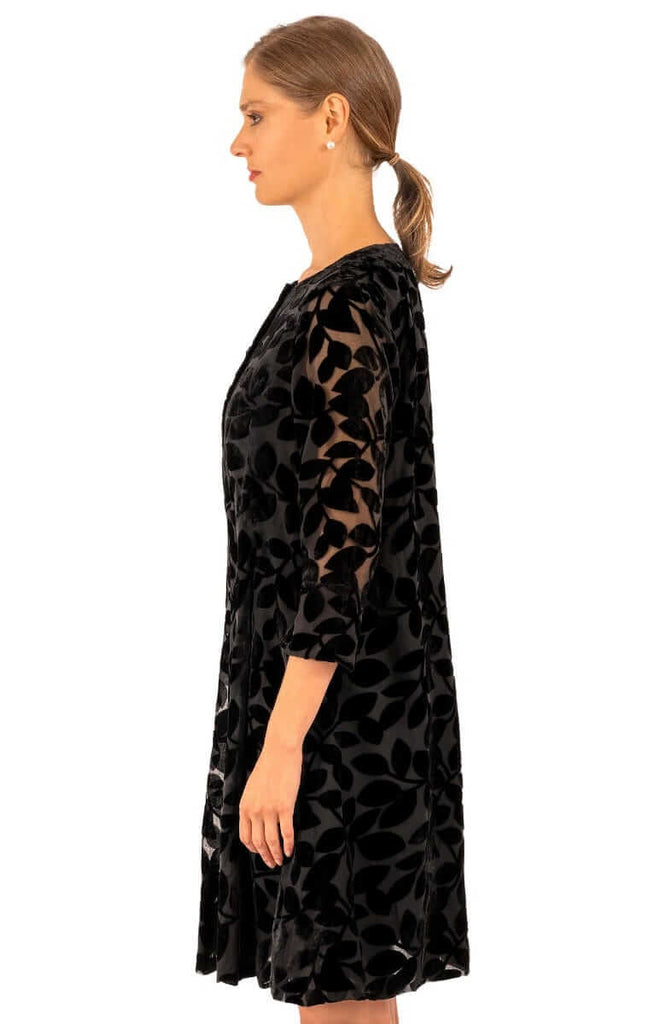 Women's Gretchen Scott Luxe Leaf Velvet Swing Dress. Black colorway. Side view.