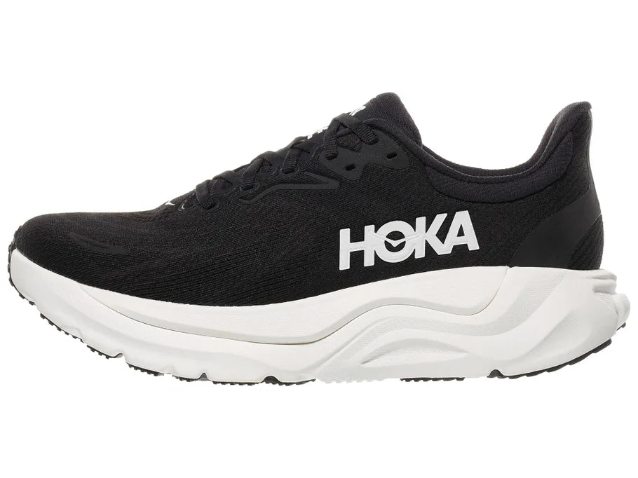 Women's Hoka Arahi 8. Black upper. White midsole. Lateral view.