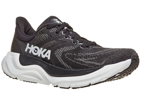 Women's HOKA Arahi 8 in Black/White, lateral view.
