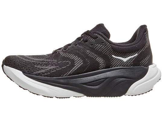 Women's HOKA Arahi 8 in Black/White, medial view.