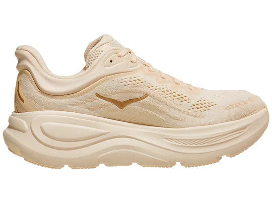 Women's Hoka Bondi 9. Cream upper. Cream midsole. Medial view. 