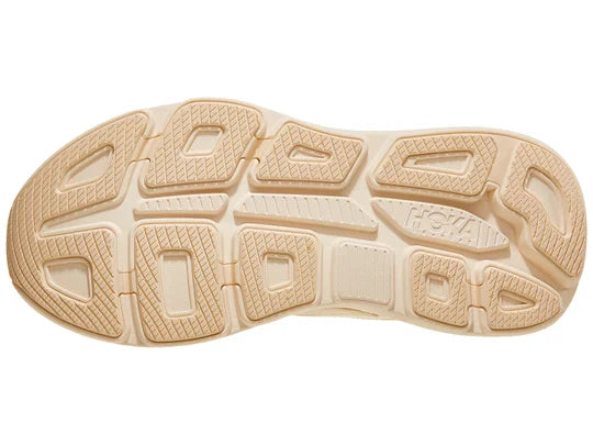 Women's Hoka Bondi 9. Cream upper. Cream midsole. Bottom view. 