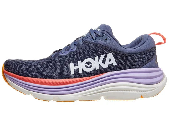 Women's Hoka Gaviota 5. Navy Blue upper. Pink, purple, and white midsole. Lateral view. 