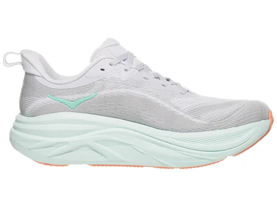Women's Hoka Skyflow. Light Grey upper. Green/Off White midsole. Medial view.