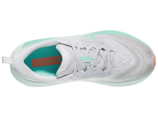 Women's Hoka Skyflow. Light Grey upper. Green/Off White midsole. Top view.