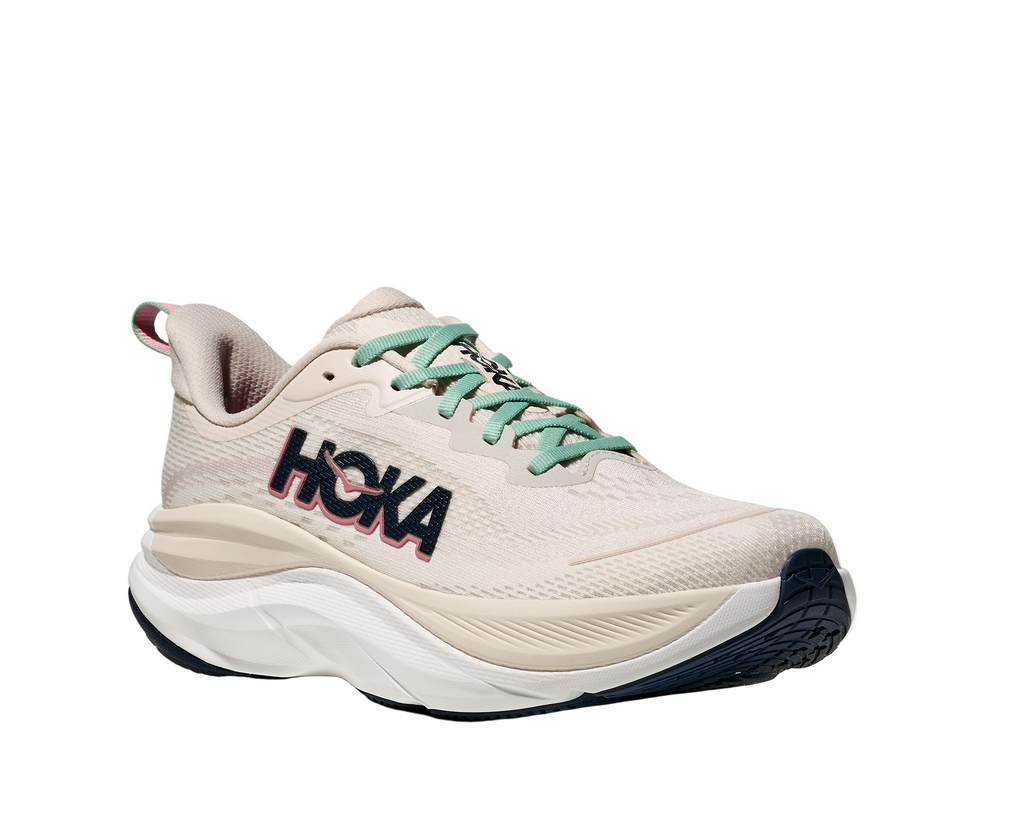 Women's Hoka Skyflow. Cream upper. White midsole. Lateral view.