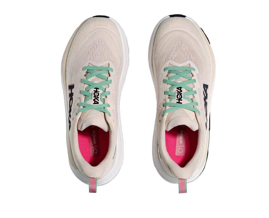 Women's Hoka Skyflow. Cream upper. White midsole. Top view.