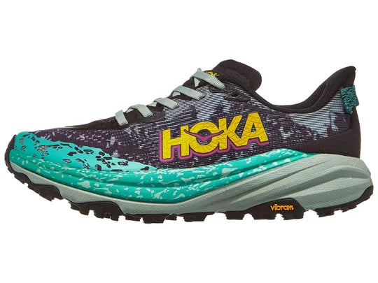 Women's Hoka Speedgoat 6. Black upper. Grey midsole. Lateral view.