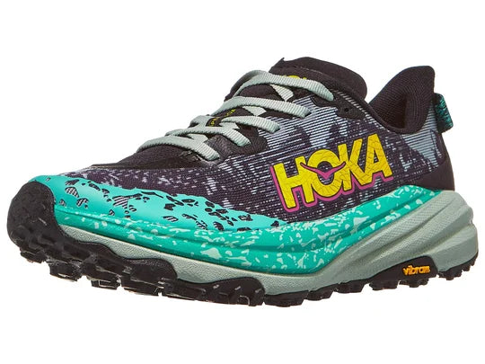 Women's Hoka Speedgoat 6. Black upper. Grey midsole. Lateral view.