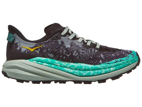 Women's Hoka Speedgoat 6. Black upper. Grey midsole. Medial view.