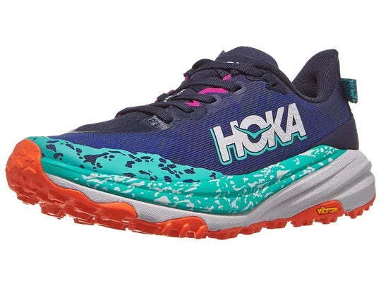 Women's Hoka Speedgoat 6. Blue upper. Grey midsole. Lateral view.