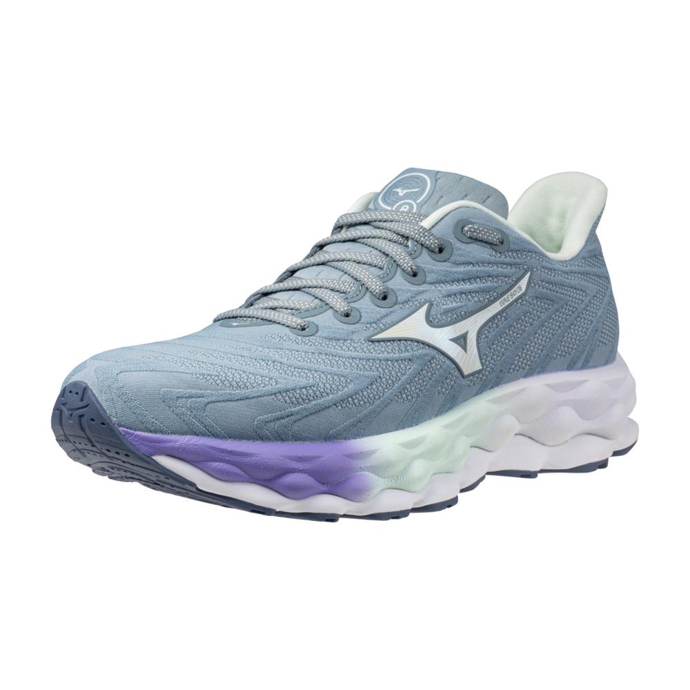 Women's Mizuno Wave Sky 8. Blue upper. Purple, green, and white midsole. Lateral view.