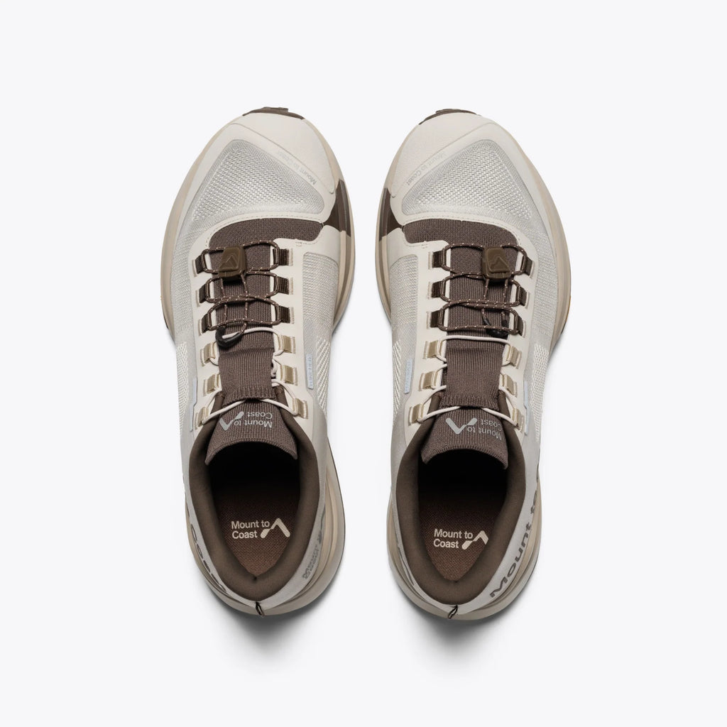 Women's Mount to Coast T1. Light Grey upper. Tan midsole. Top view.