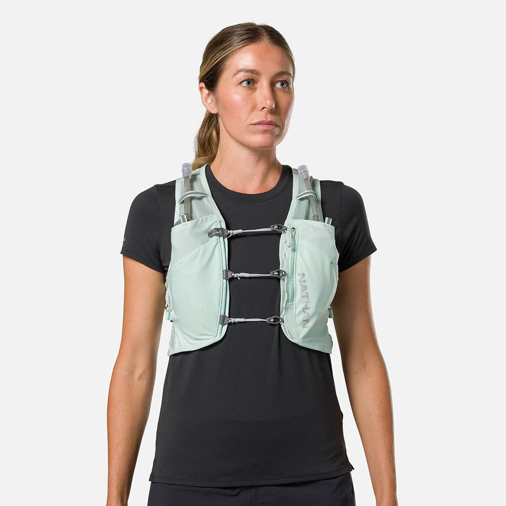 Women's Nathan Breeze 4 Liter Hydration Vest. Mint green. Front view.