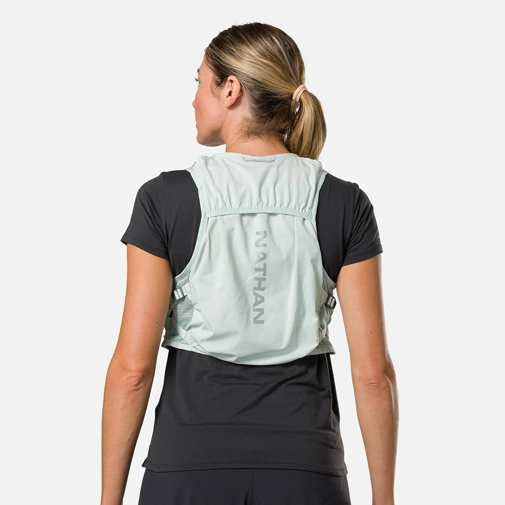 Women's Nathan Breeze 4 Liter Hydration Vest. Mint green. Back view.