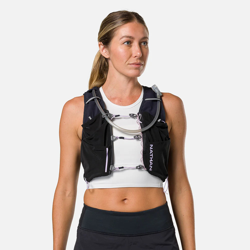 Women's Nathan Pinnacle Pro 12 Liter Hydration Vest. Black. Front view.