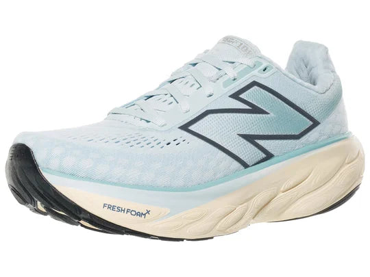Women's New Balance 1080 v14. Light Blue upper. Off white midsole. Lateral view.
