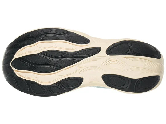 Women's New Balance 1080 v14. Light Blue upper. Off white midsole. Bottom view.