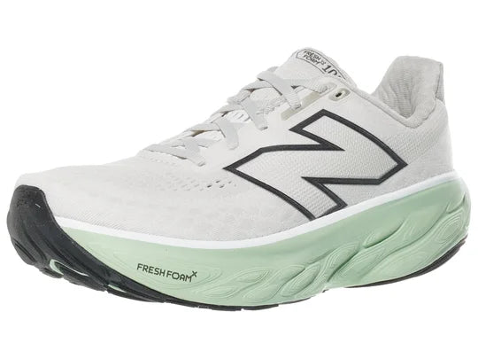 Women's New Balance 1080 v14. Light grey upper. Light green midsole. Lateral view.