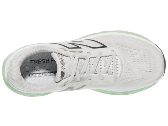 Women's New Balance 1080 v14. Light grey upper. Light green midsole. Top view.