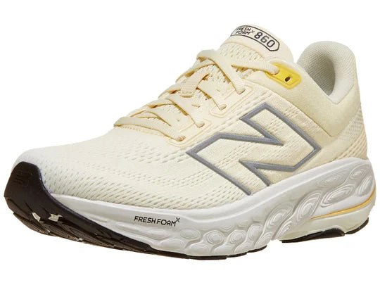 Women's New Balance 860v14. Light Yellow upper. White midsole. Lateral view.
