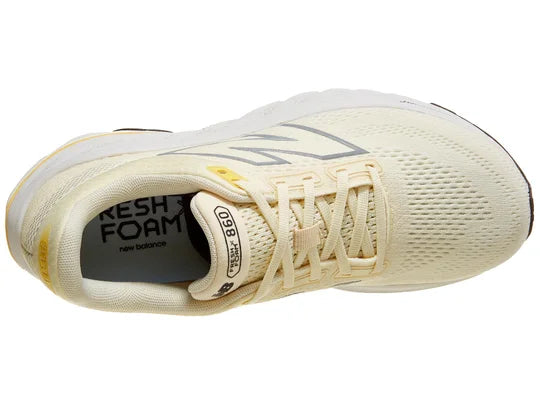 Women's New Balance 860v14. Light Yellow upper. White midsole. Top view.