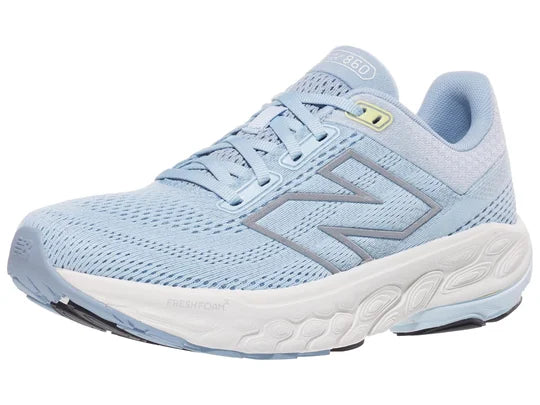Women's New Balance 860 v14. Light Blue upper. White midsole. Lateral view.