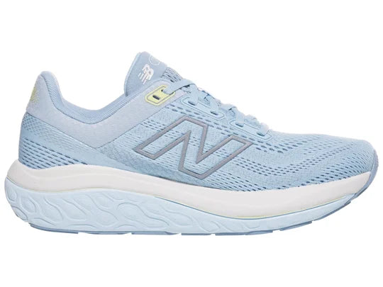 Women's New Balance 860 v14. Light Blue upper. White midsole. Medial view.