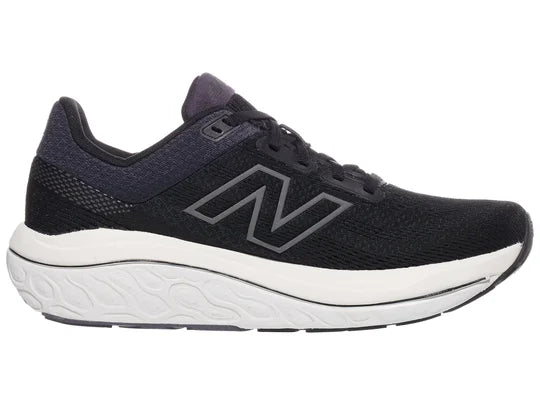 Women's New Balance Fresh Foam X 860 v14 in Black/White, medial view