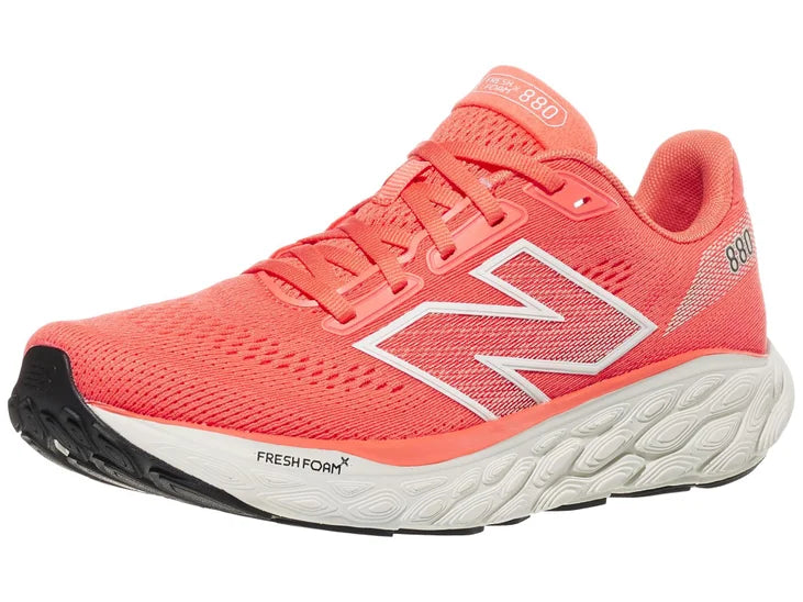 Women's New Balance 880 v14. Red upper. White midsole. Lateral view.