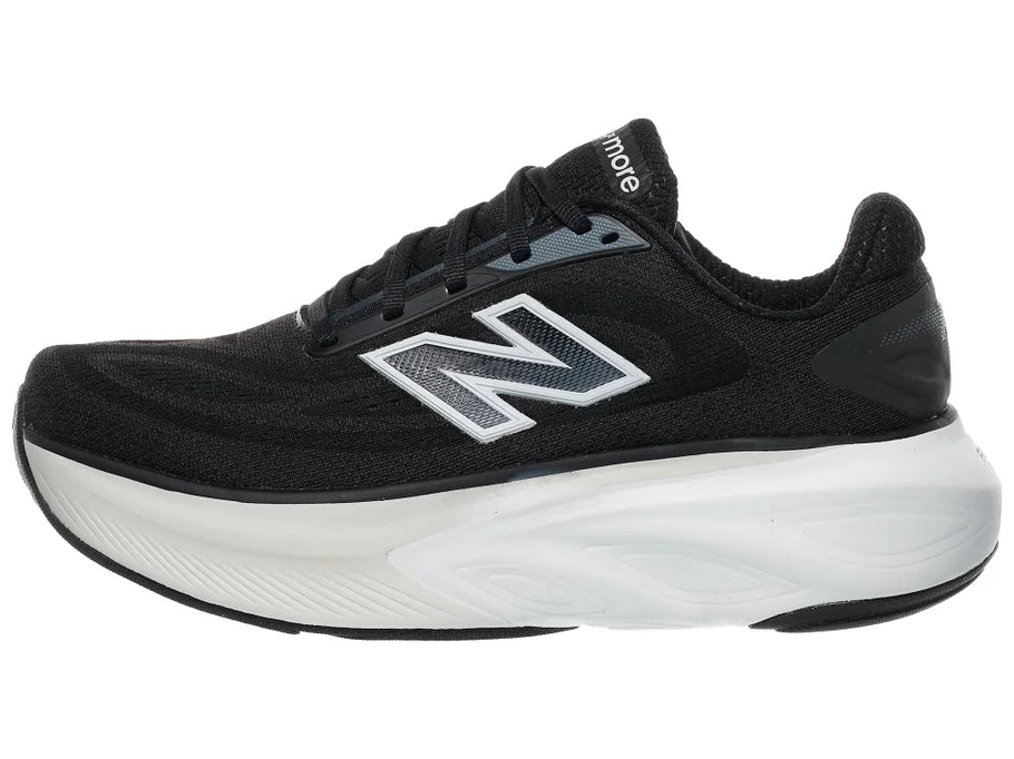 Women's New Balance More v6. Black upper. White midsole. Lateral view.