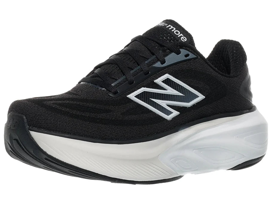 Women's New Balance More v6. Black upper. White midsole. Lateral view.