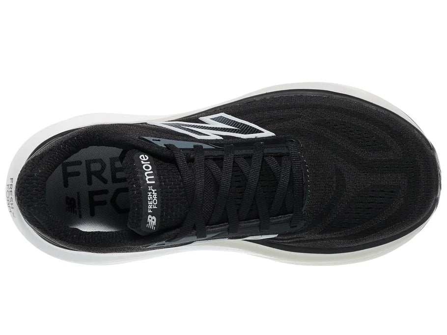 Women's New Balance More v6. Black upper. White midsole. Top view.