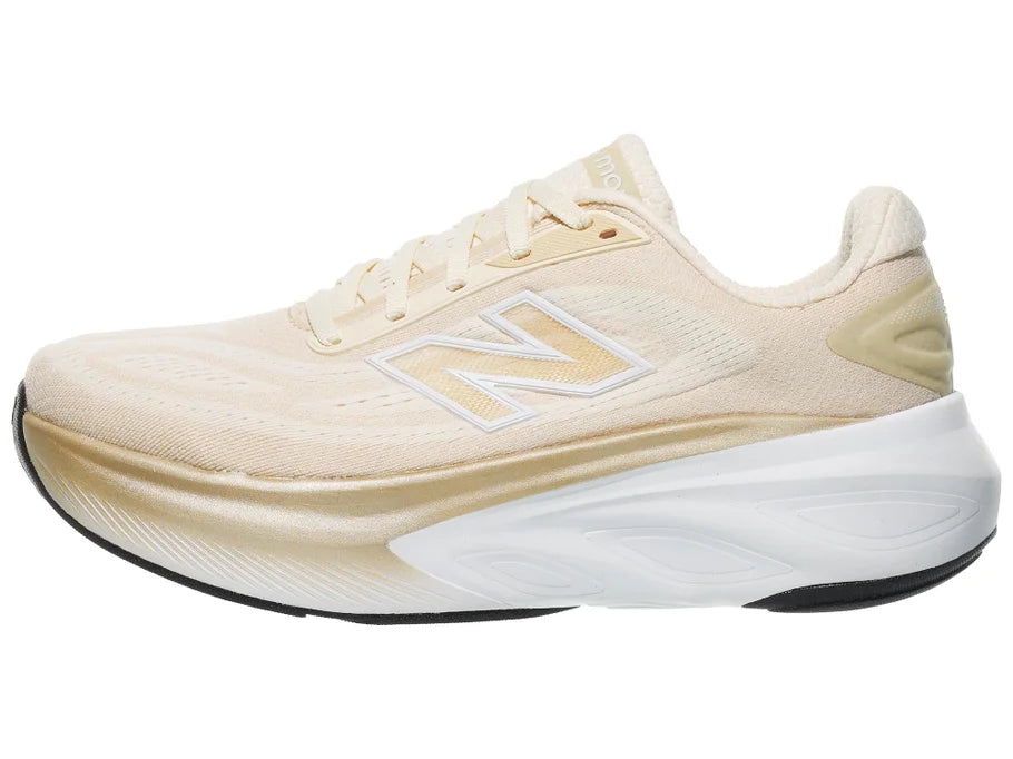 Women's New Balance More v6. Off White upper. White midsole. Lateral view.